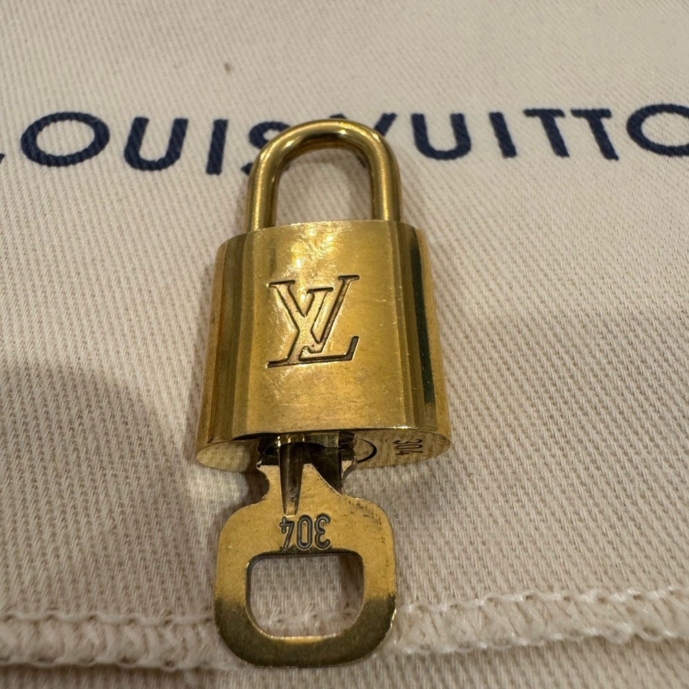 Louis Vuitton Gold Padlock and Key Set